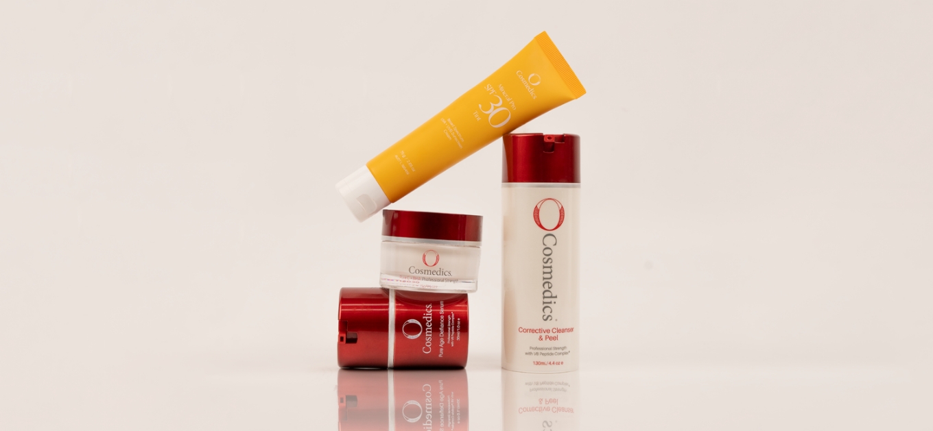 An O Cosmedics Skin Care Routine consisting of essential skincare products such as cleanser, serum, hydrator and SPF sunscreen.